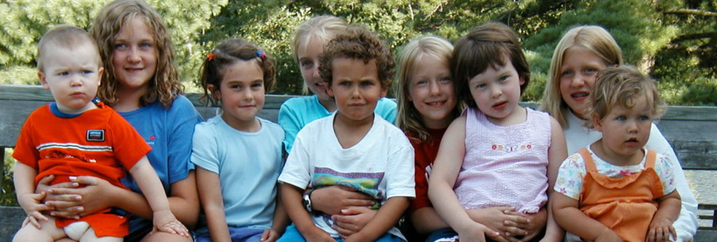 All Kids sitting on deck in Canada